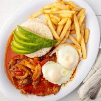 Churrasco Ecuatoriano · Grilled beef sautéed with tomato and peppers, topped with fried eggs and served with rice, f...