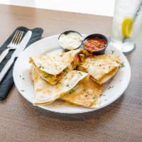 Quesadilla · Flour tortilla with peppers, onions, and Monterey Jack cheese. Served with sour cream, fresh...