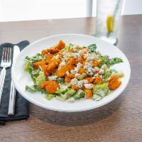 Buffalo and Blue Salad · The garden salad with breaded Buffalo chicken, topped with blue cheese crumbles, and blue ch...