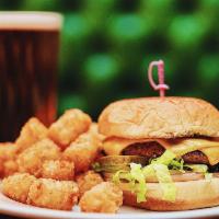 Beyond Burger · Like the bonus room burger but beyond. Served on a potato bun with American cheese and a sid...