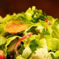 Chopped Salad · Romaine, house pickles, green goddess and everything spice. Vegetarian.