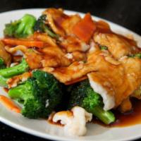 79. Chicken with Broccoli · Served with rice.