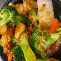 140. Mixed Vegetables with Garlic Sauce · Spicy. Served with rice.