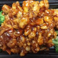 H12. Sesame Beef · Crispy, golden tender beef served in mildly seasoned sauce with broccoli and sesame. Spicy.