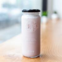 Piglet | Strawberry Coconut Milk · Caffeine-free! Ice cold coconut milk blended with our handcrafted strawberry syrup.