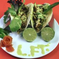 Lari's Tacos · Your choice of flour tortilla or hard corn shell. Chicken or beef, cheese, salsa and sour cr...