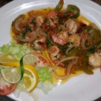 154. Bistec Salteado con Camarones · Pepper steak with shrimp.