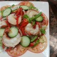 61. Langosta Salad · Lobster..the salad comes with tomatoes lettuce cucumbers seasoned with lemon vinegar and oil...