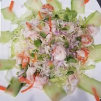 62. Camarones Salad · Shrimp..the salad comes with tomatoes lettuce cucumbers seasoned with lemon vinegar and oil ...
