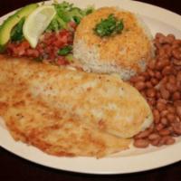 82. Pescado Frito lunch · Fried fish. Served with rice and beans. 