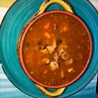 51. Mondongo Sopa · Beef tripe. tripe soup carries carrots and potatoes