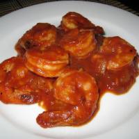 165. Camarones en Salsa Roja · Shrimp in red sauce.