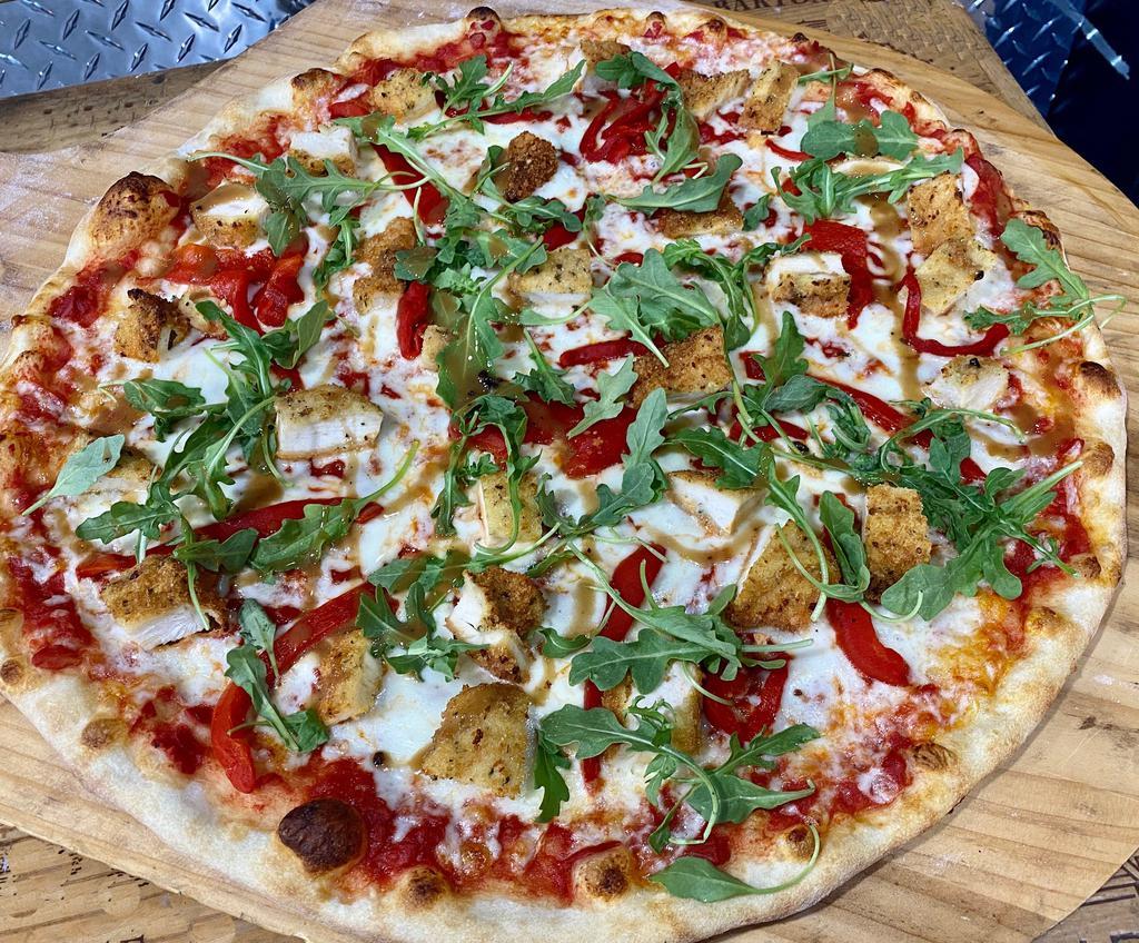 Chicken Cutlet Pizza w/balsamic reduction · Large.  Plum Tomato Sauce, Mozzarella Cheese, Chicken Cutlet, Roasted Peppers, Baby Arugula, Drizzle with Balsamic Reduction
