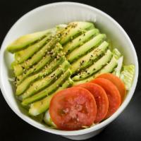 Avocado Salad · Lettuce, avocado, tomato topped with layers of avocado and French dressing.