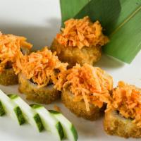 D8. King Kong Roll · Deep fried spicy salmon, avocado, jalapeno topped with chopped spicy kani and special sauce.