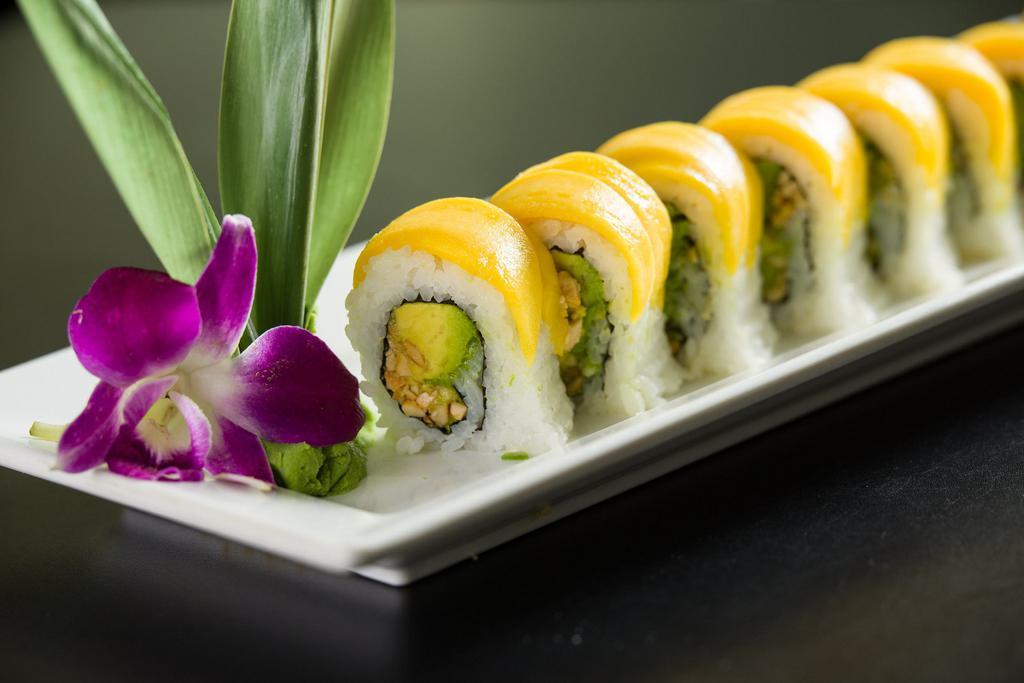 C17. Mango Delight Vegetarian Roll · Avocado and cashew topped with mango.