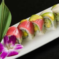 E6. Rainbow Roll · Supper California roll wrapped with salmon, tuna, white fish and avocado.