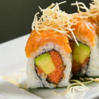 E9. Dancing Roll · Spicy tuna and avocado topped with spicy salmon and potato crunch.