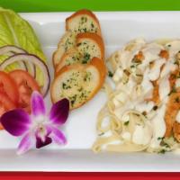Fettuccini Alfredo with Chicken Specialty · A delicious pasta covered with our creamy sauce.