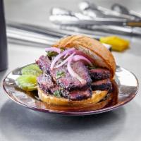 Brisket Sandwich · Slow smoked, red wine and rosemary, sliced Angus beef brisket on a challah bun. Available wi...