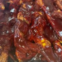 BBQ Ribs · Meal size come with white Rice Or Yellow Rice and Beans two portion of meat .
Please chose w...