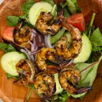 Grilled Shrimp Salad · Mixed greens, tomatoes, cucumbers, onions, kalamata olives, homemade Italian dressing 
Grill...