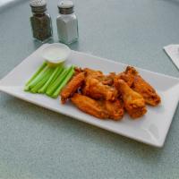 Boneless Buffalo Wings · Hot and Spicy. served with celery and blue cheese dressing.