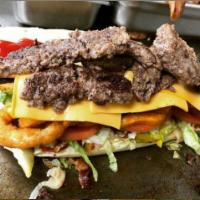 107. Double Bypass Sandwich · 2 1 lb. burgers, bacon, American cheese, fries, onion rings, lettuce, tomato, pickles, ketch...