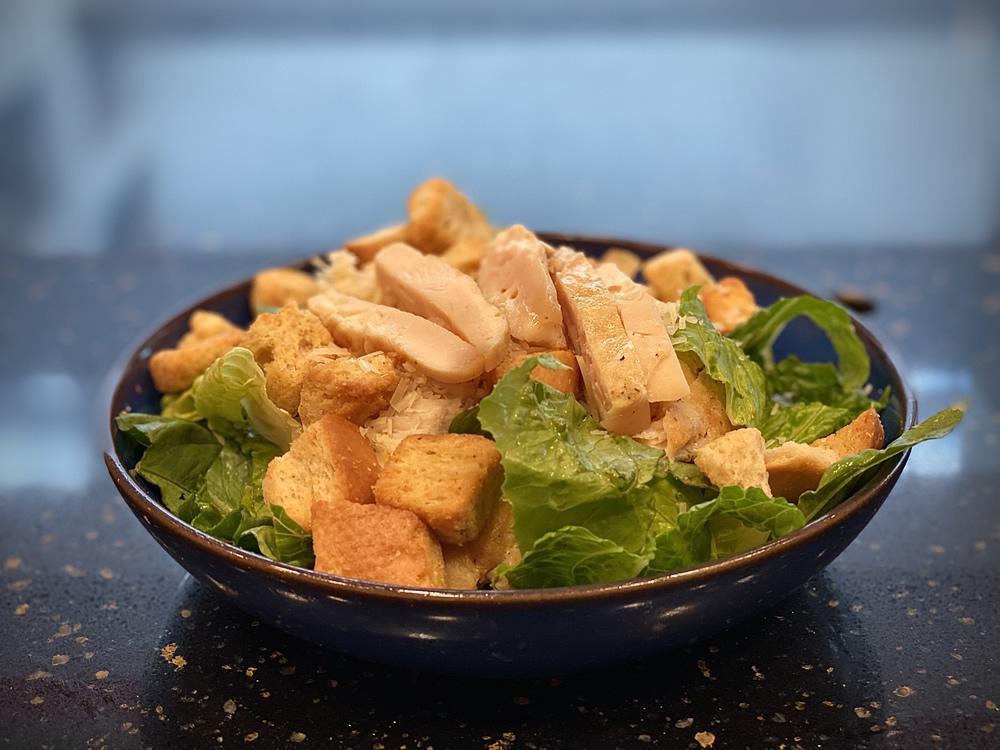 Chicken Caesar Salad · Grilled or tender chicken. Romaine lettuce, croutons and Parmesan cheese.
