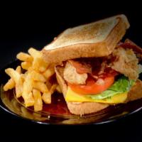 Texas Club · Lettuce, tomato, bacon, American cheese, grandma sauce and french fries.