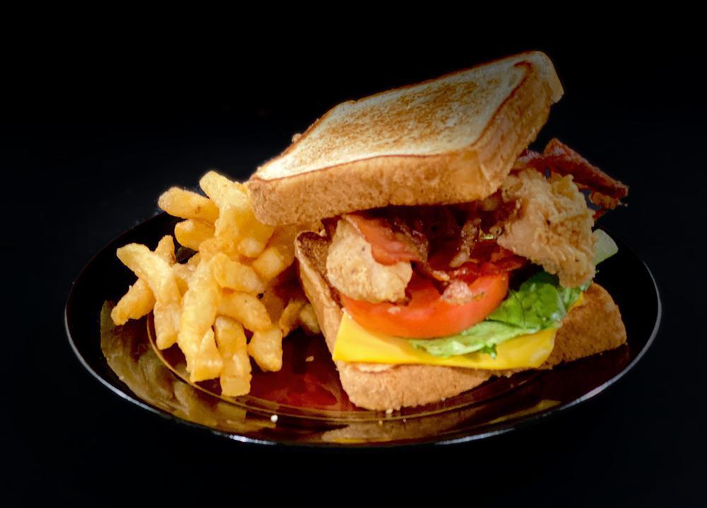 Texas Club · Lettuce, tomato, bacon, American cheese, grandma sauce and french fries.