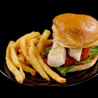 Chicken Sandwich · Lettuce, tomato and grandma sauce and French fries.