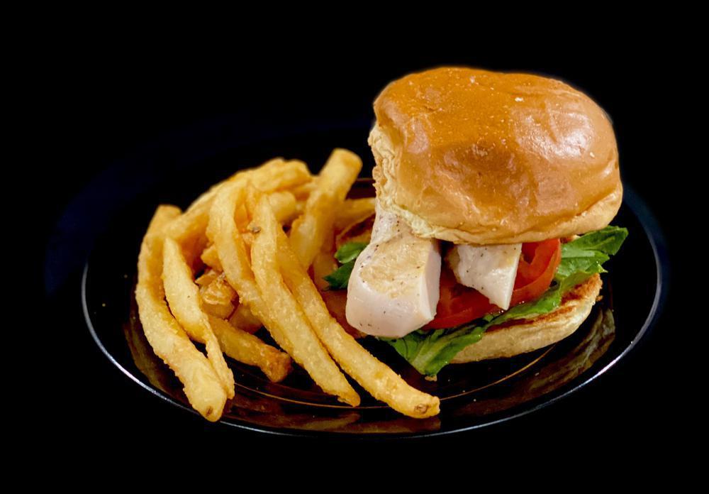 Chicken Sandwich · Lettuce, tomato and grandma sauce and French fries.