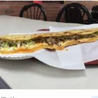 Machete  · a large home made corn tortilla  covered with mozzarella cheese your choice of meat beef faj...