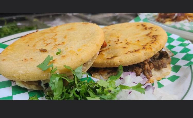 2 Gorditas · Stuffed corn cake. two gorditas filled with black refried beans mozzarella cheese your choice of meat pressed pork, beef fajitas , chicken carnitas ,pastor, lamb or shredded beef cilantro & onions on the side 