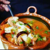  Sopa Mariscos · Seafood soup.  include 8 Oz of fish fillet 6 jumbo shrimp fresh red potatoes fresh mushrooms...