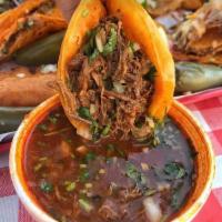 5 -Birria tacos with cheese · Folded tortilla with  cheese. your choice of  meat lamb or beef one cup of beef or lamb  bro...