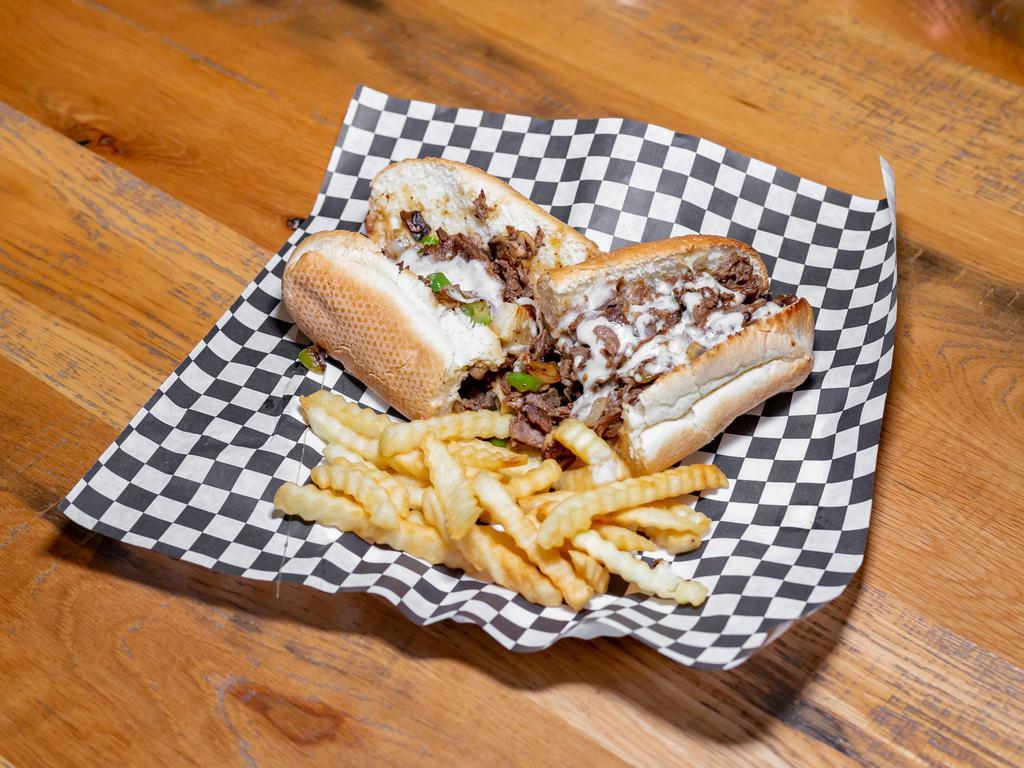 Philly Steak Sandwich · Onions, peppers, mushrooms, and cheese.