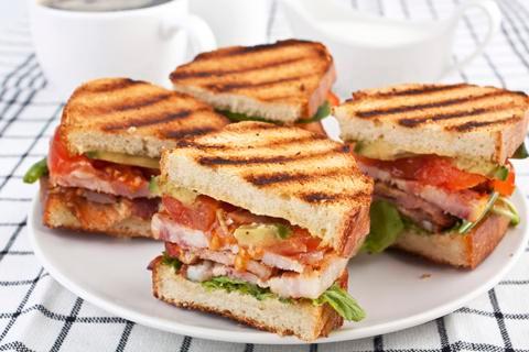 Turkey Triple Decker Sandwich · Turkey, cheese, bacon, lettuce, tomatoes, and mayo.