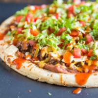 8. Mexican Taco Pizza · Ground beef, onions, jalapenos, fresh lettuce, fresh tomatoes.