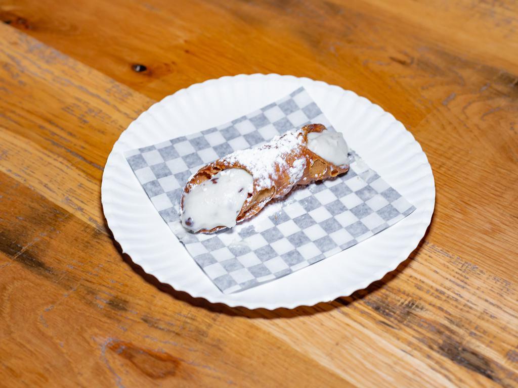 Cannoli · Fried pastry with a sweet creamy filling.