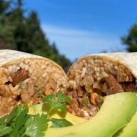 Burrito · Flavorful fillings in a flour tortilla wrap. Chicken has a little kick! Steak is a tender sh...