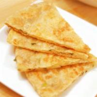 26. Scallion pancake 葱油饼 · With young mild onions.