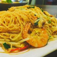 63. Singapore Chow Mei Fun 新加坡炒米粉 · Thin rice noodles.A little hot and spicy. Chicken,pork and shrimp some vegetables mix togeth...