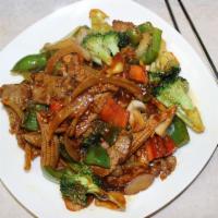 Hunan Beef · Fresh steak with bell pepper, baby corn, mushroom and broccoli. Served with steamed white ri...