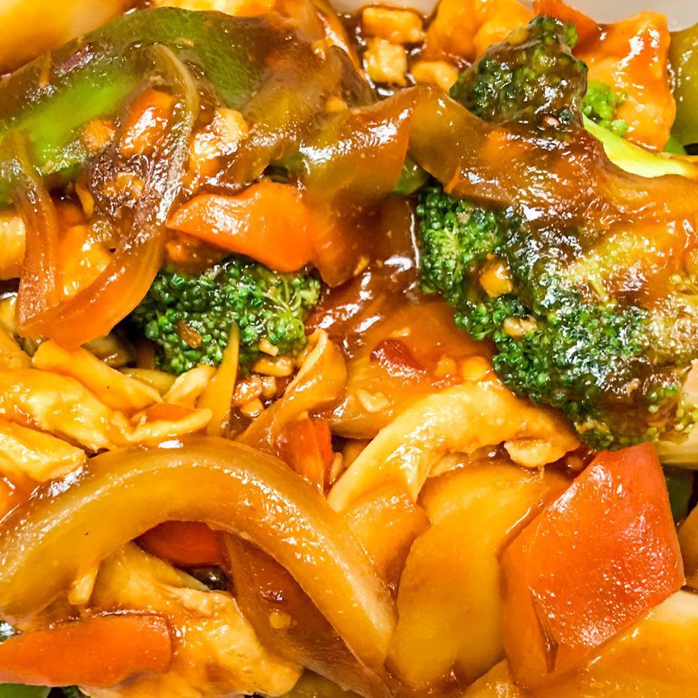 Szechuan Chicken · Stir fried with broccoli, carrot, snow peas, baby corn, water chestnuts, mushroom, onion and bell pepper in a spicy brown sauce. Served with steamed white rice. Hot and spicy.