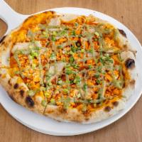 The Buffalo Pizza · Buffalo cauliflower, fresh mozzarella cashew based, green onion, and ranch dressing.