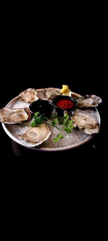 Blue Point Oyster (6 Pieces) · Raw Blue Point Oysters served with Cocktail and Ponzu Sauce