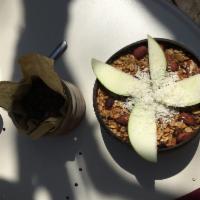 Granola Bowl · Housemade granola with fresh fruit, coconut flakes and homemade cashew milk