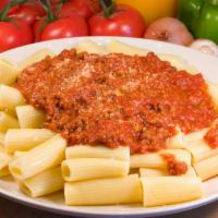 Pasta with Meat Sauce · Served with fresh, hot garlic bread.